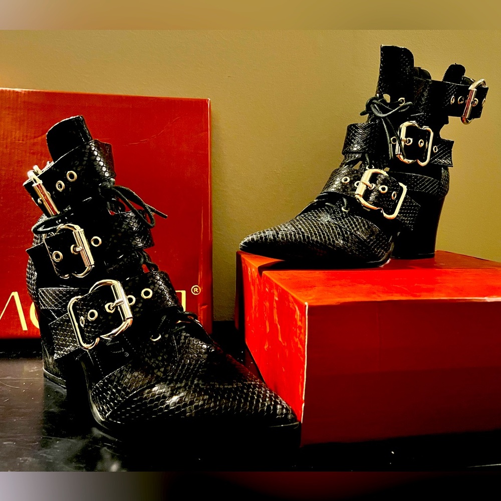 Black “witchy” edgy boot. 2” heel. Worn twice. Like new.